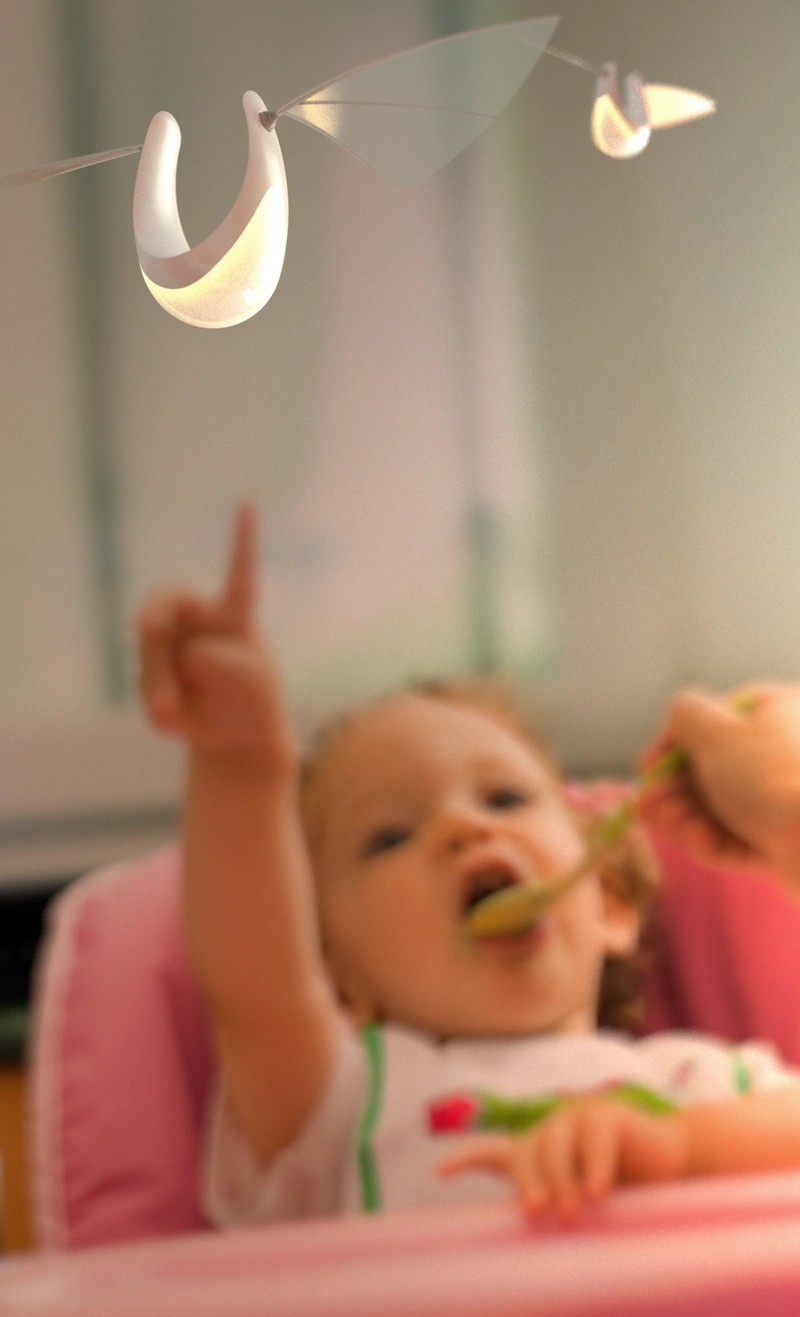 An illustration showing a baby pointing to a Flyht lamp.